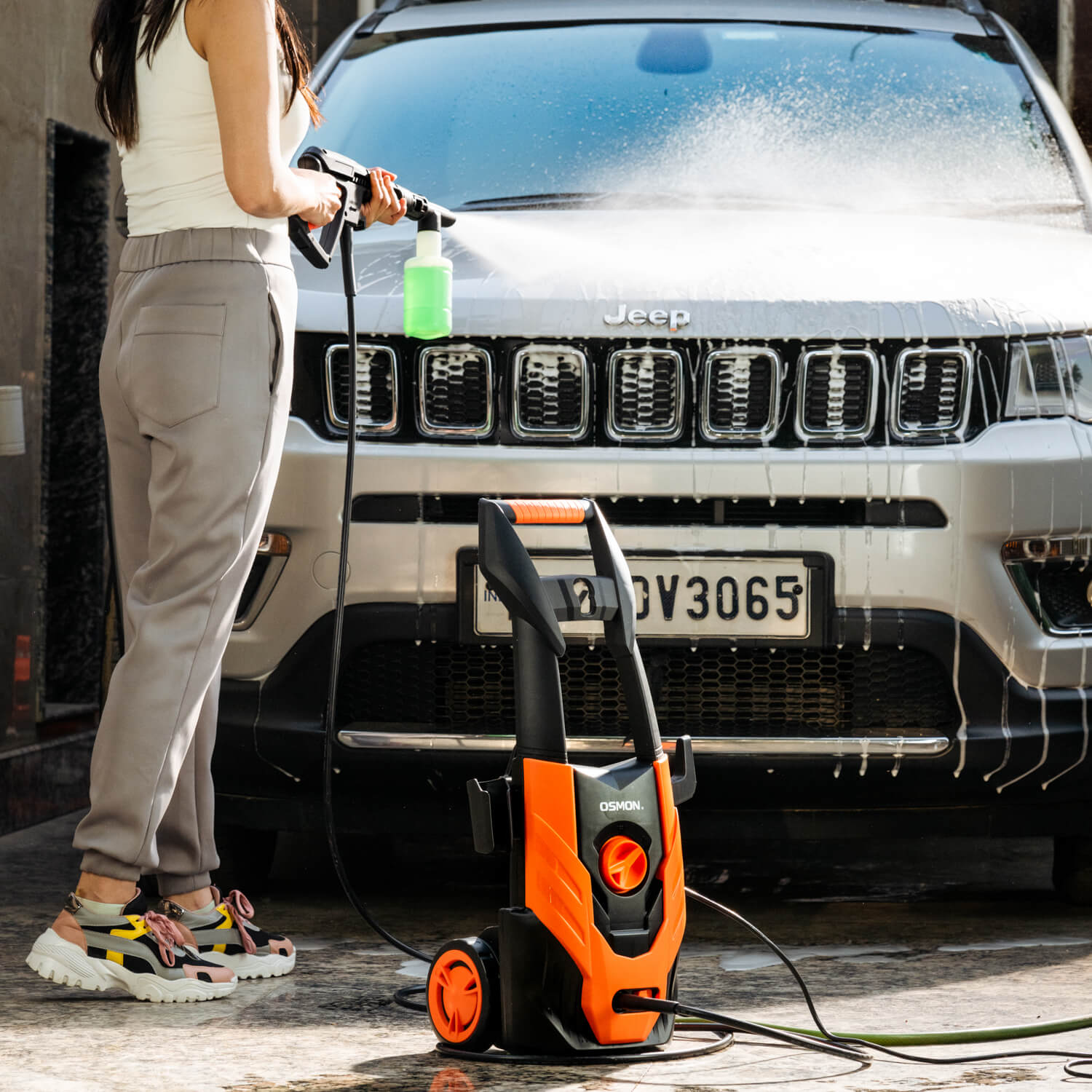 The image showcases the OS PW140 pressure washer, a versatile cleaning tool uses for cleaning a Jeep Compass Car