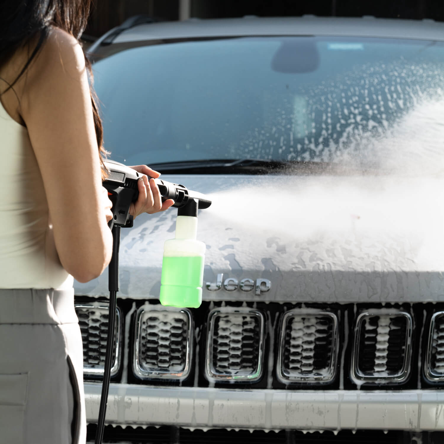 The image showcases the OS PW140 pressure washer, a versatile cleaning tool uses for cleaning a Jeep Compass Car specially focuses on car