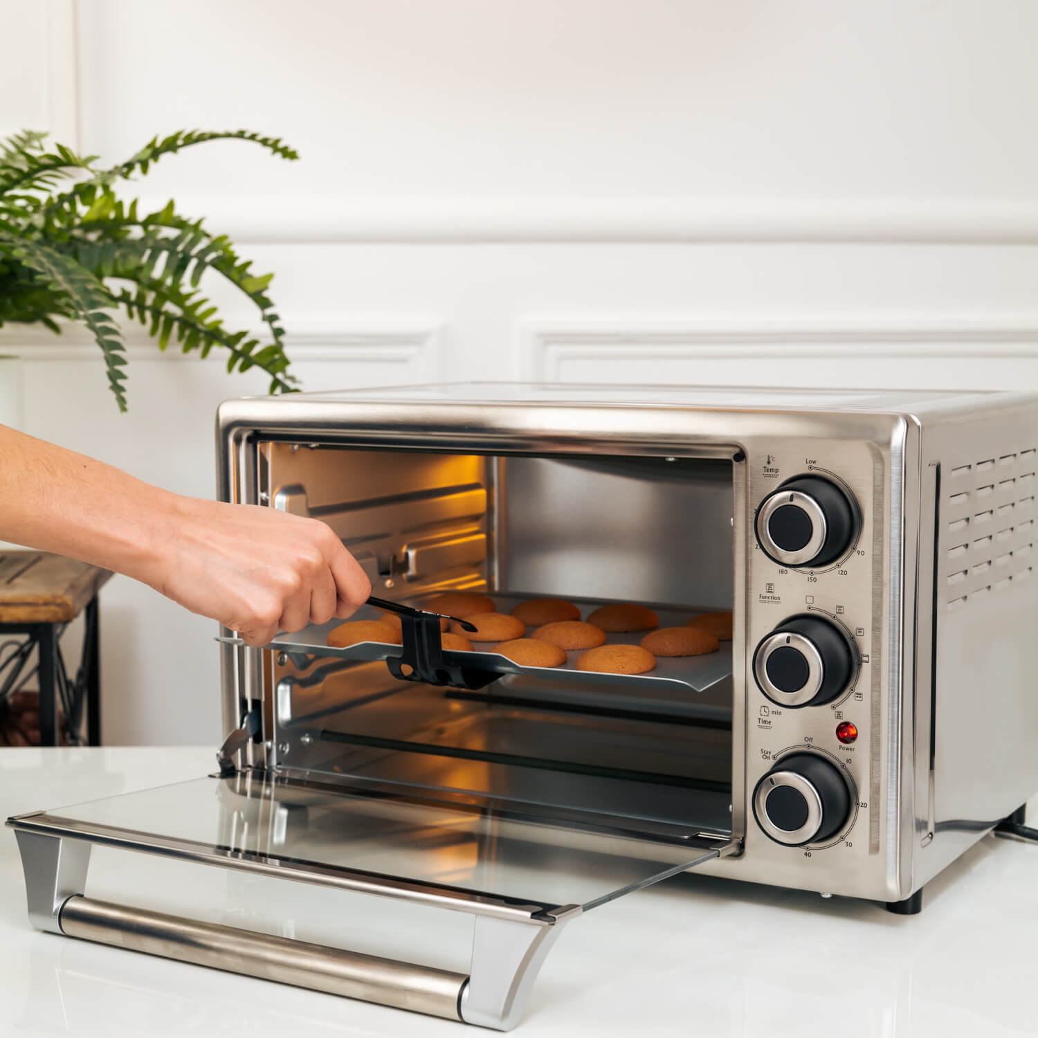 Osmon OTG Oven showcases Baking feature by baked a cookies