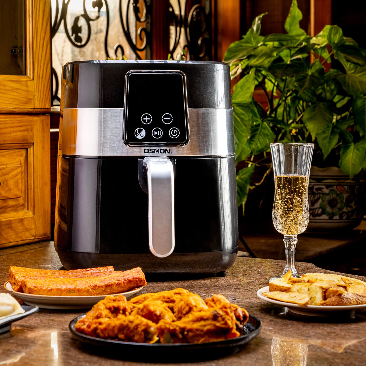 Showcasing 4 Ltr Digital Air fryer with silver & black colour with some mouth watering and crispier snacks