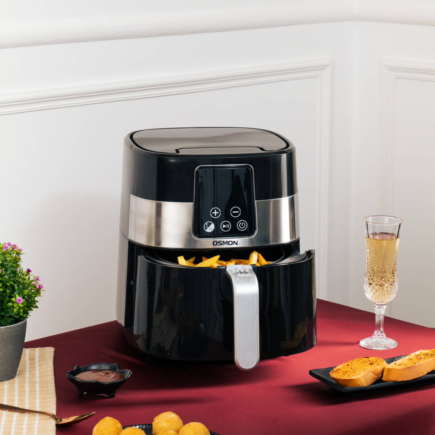 Showcasing 4 Ltr Air fryer with silver & black colour having fries in its 3.2 Ltr basket